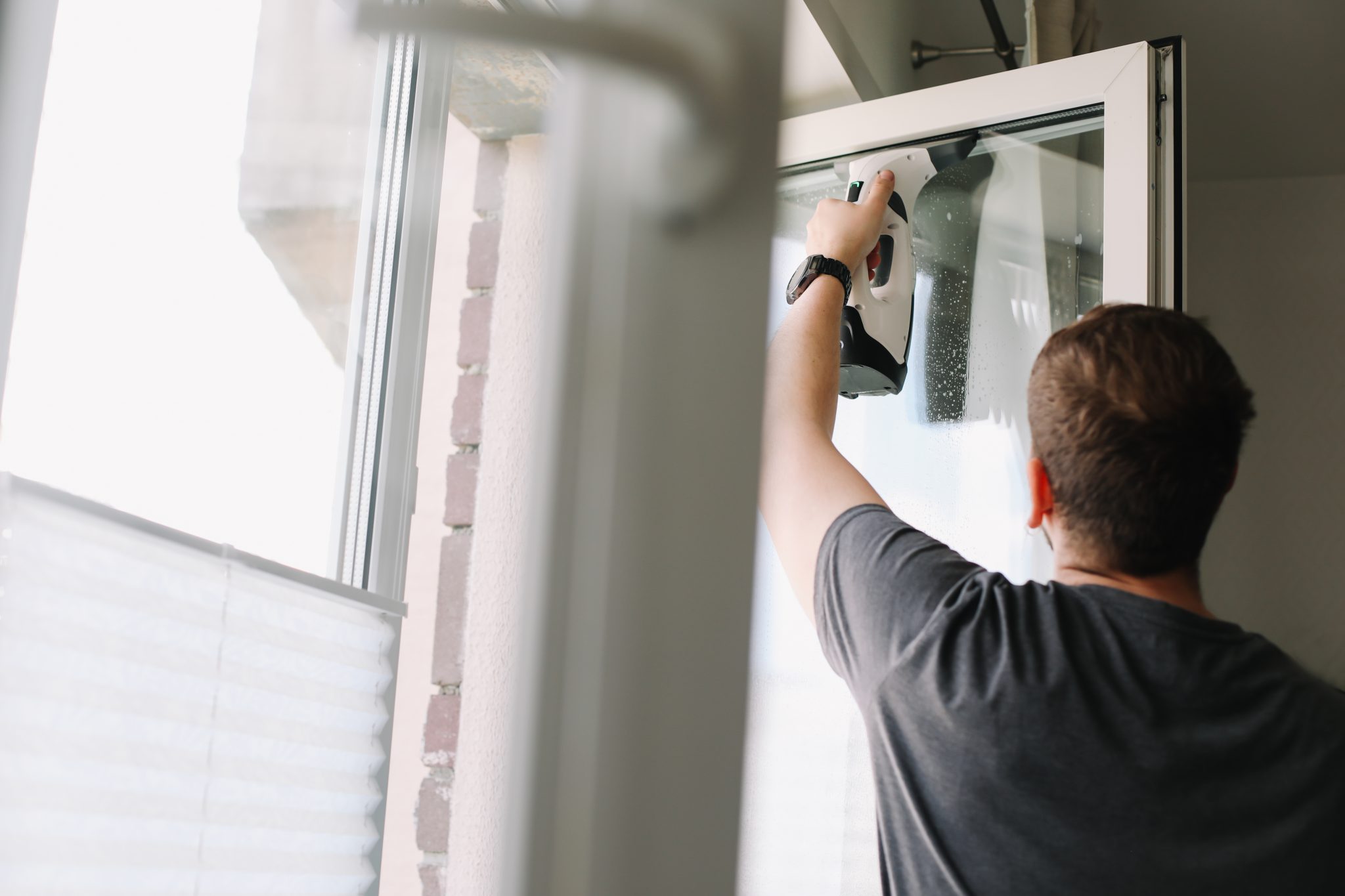 washing and cleaning window at home. Housework and housekeeping, home hygiene